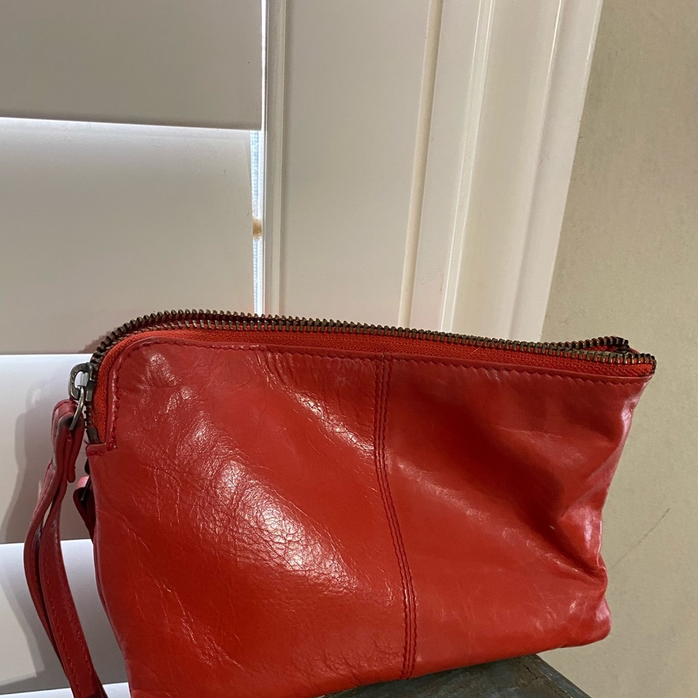 Women’s red Latico wristlet wallet